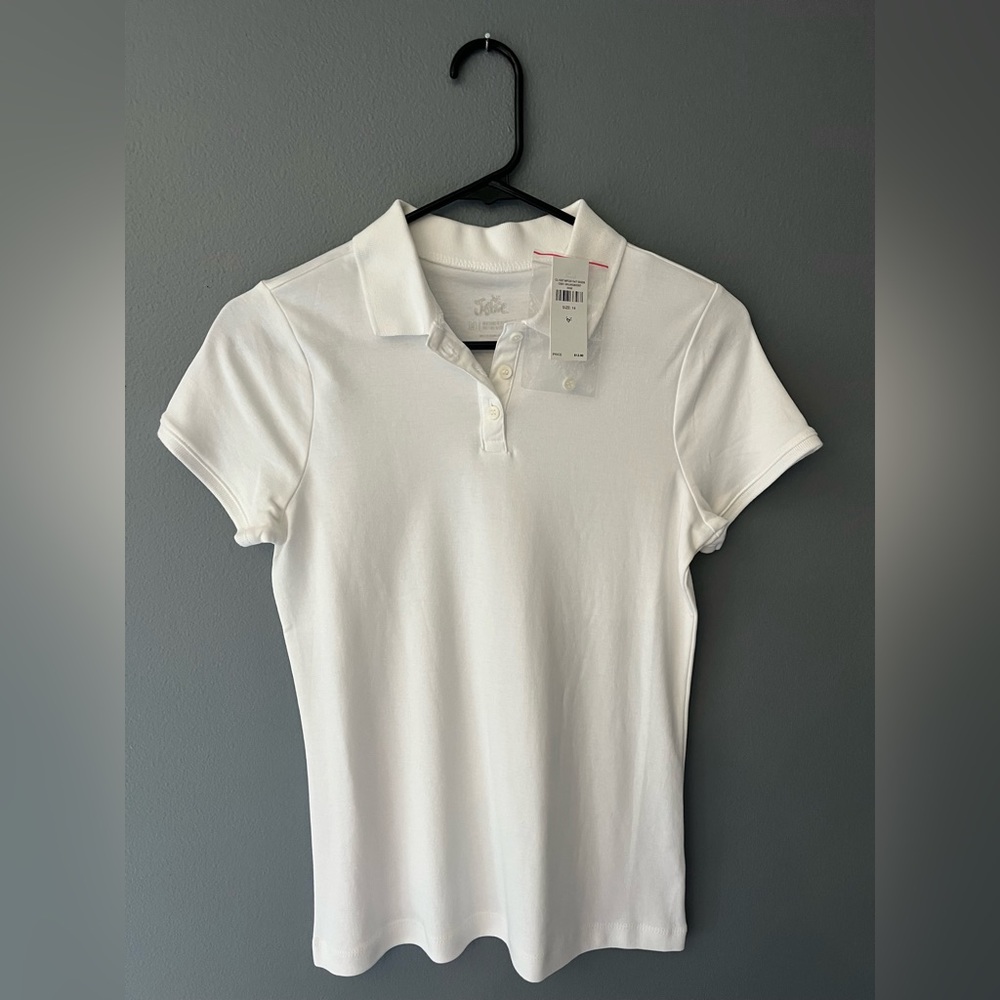 NWT white JUSTICE school uniform shirt. Size 14